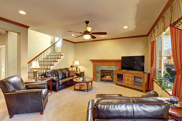 istock Luxury living room interior with fireplace and carpet floor 577979192
