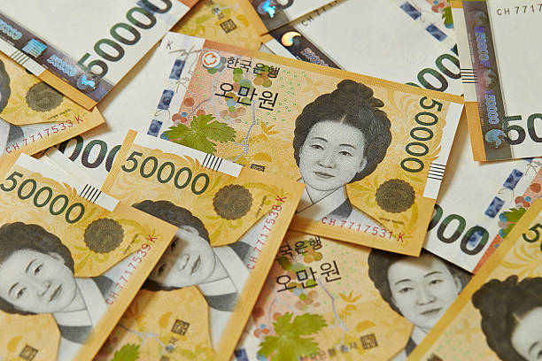 won coreano facturas - korean currency fotografías e imágenes de stock