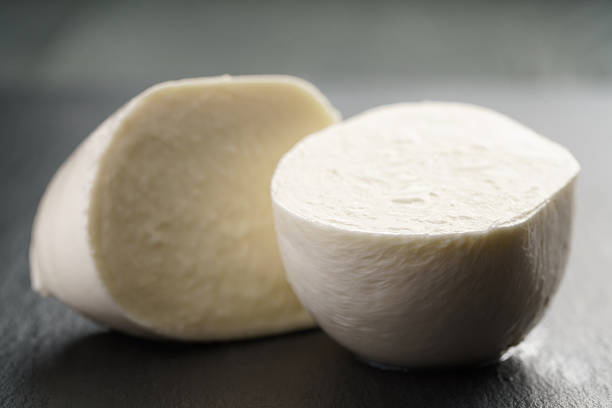 istock sliced mozarella ball on slate background 578075126