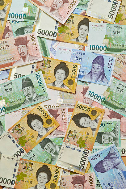 won coreano facturas - korean currency fotografías e imágenes de stock