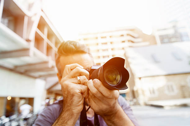 istock Male photographer taking picture 578075464