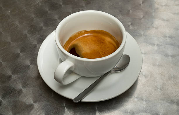 istock Cup of coffee on metal surface 578076394