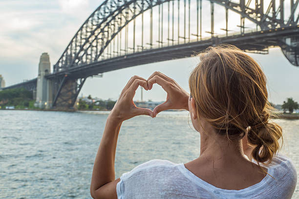 istock Young woman loving Sydney, Australia 578077440