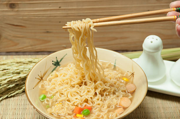 istock Bowl of instant noodles on bamboo mats 578077452
