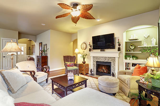 istock Cozy living room with fireplace and rug 578077780