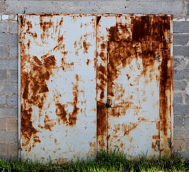 istock old metal warehouse door 578078596