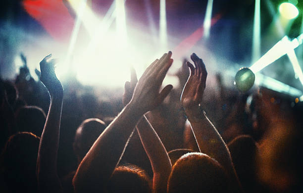 istock People at concert party. 578079172