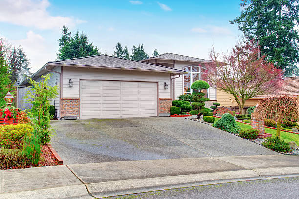 istock Modern house exterior with garage and nice landscaping desing 578079780