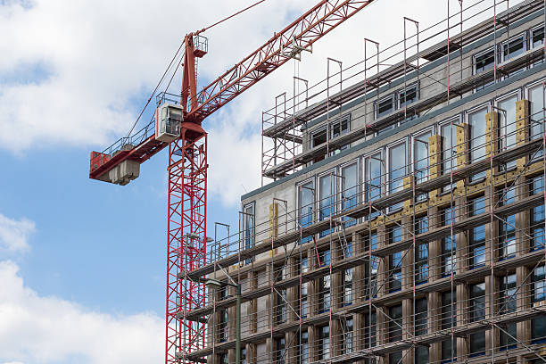 istock scaffolding and crane on building facade 578080166