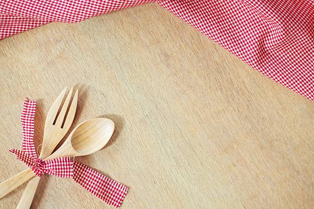 istock Kitchen utensils on wooden background 578080674