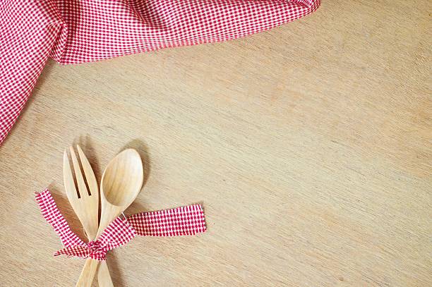 istock Kitchen utensils on wooden background 578081472