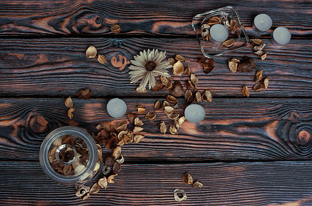 istock Small candles with dry flowers 578081576