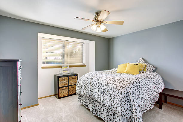 istock Bedroom interior with walls in blue tones and carpet floor 578082184