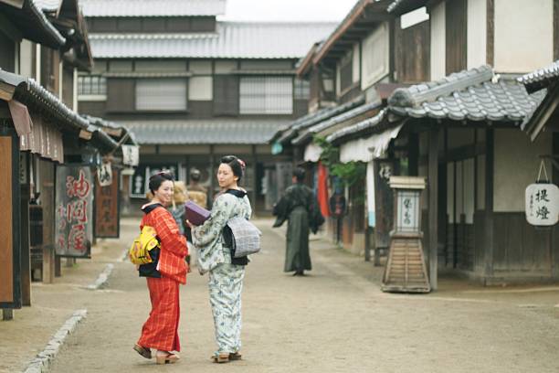 istock Women look back in Edo Period street 578082708