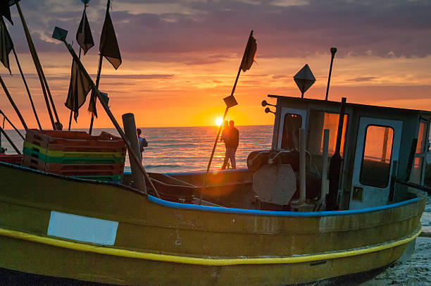 istock Majestic sunset over fisherman's boat 578083312