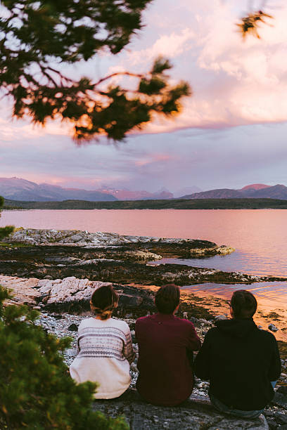 istock Three people near the fjord 578085914
