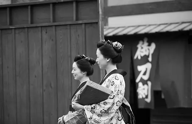 japanese housewifes with kimono in toei studio oldtown kyoto japan-black and white