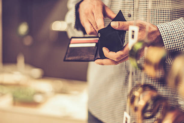 istock Young man with credit cards 578087034