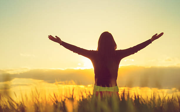 Woman feeling free in a beautiful natural setting