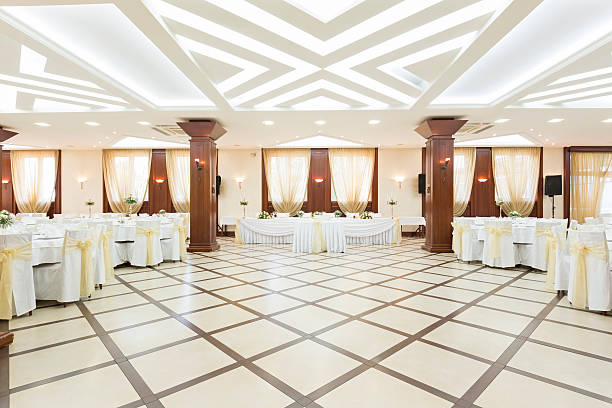 Wedding hall or other function facility set for fine dining Wedding hall or other function facility set for fine dining wedding hall stock pictures, royalty-free photos & images