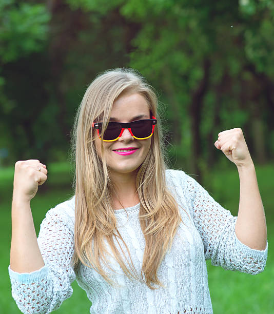 istock Happy Soccer fan with german sun glasses 578089508
