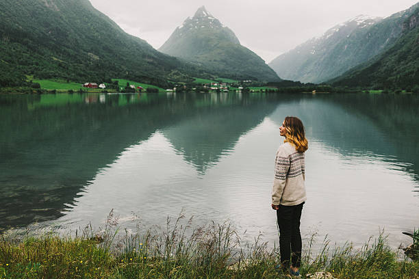 istock Woman near the lake 578091942