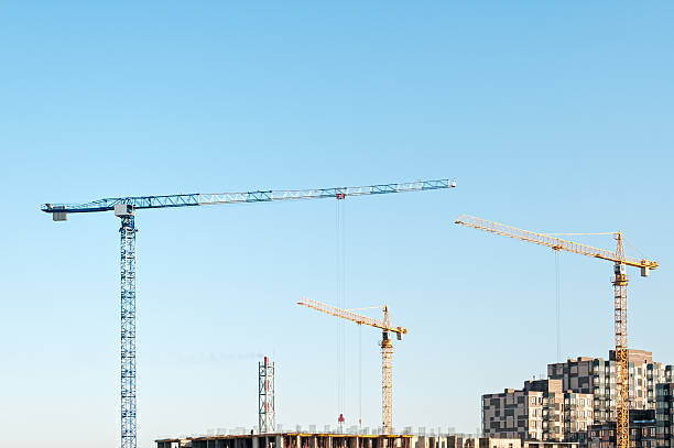 istock Multistorey multistorey buildings construction site with tower cranes 578093008