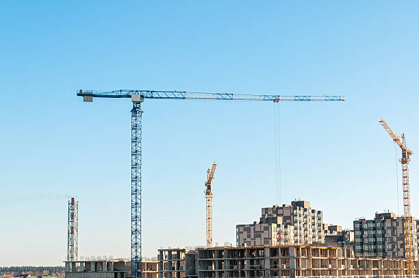 Multistorey multistorey buildings construction site with tower cranes