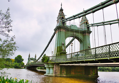 Hammersmith bridge over Thames river in London, England.