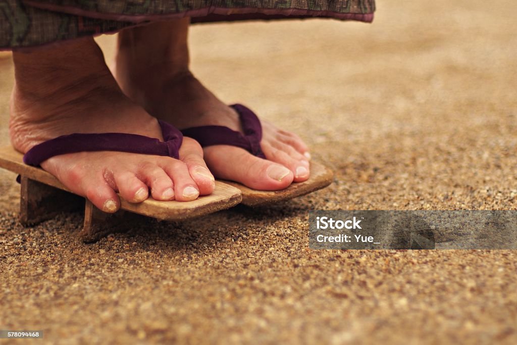 Foot of elderly woman in Geta Legs of an elderly woman wearing clogs Edo Period Stock Photo