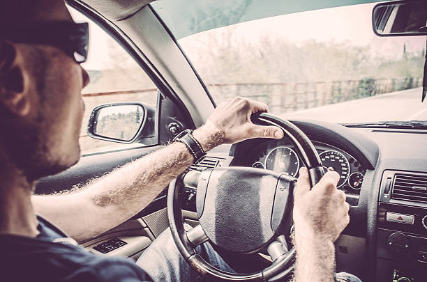 istock Portrait of a Man driving his Car 578094484