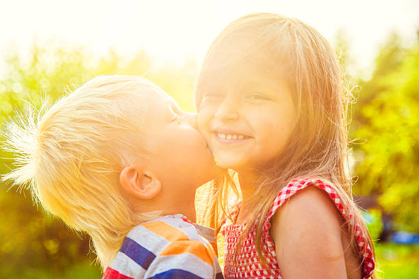 istock Shildren kissing 578094518