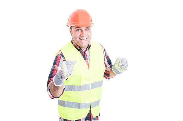 istock Cheerful engineer in safety clothes enjoying success 578095260