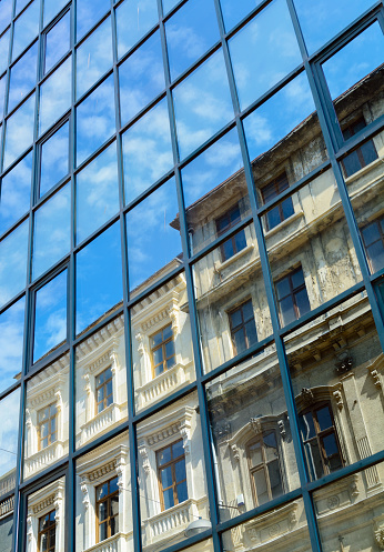 Reflected office building in the windows of another building.