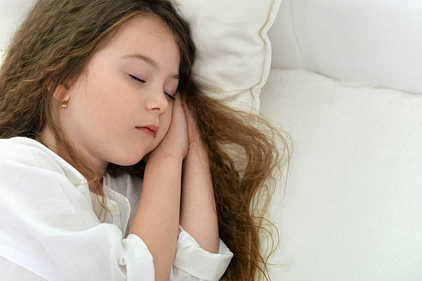 istock Cute little girl sleeping 578095692