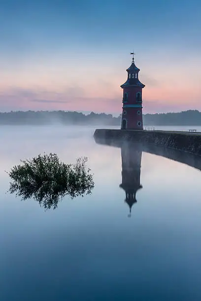 Inland lighthouse of Moritzburg in the early morning at sunrise