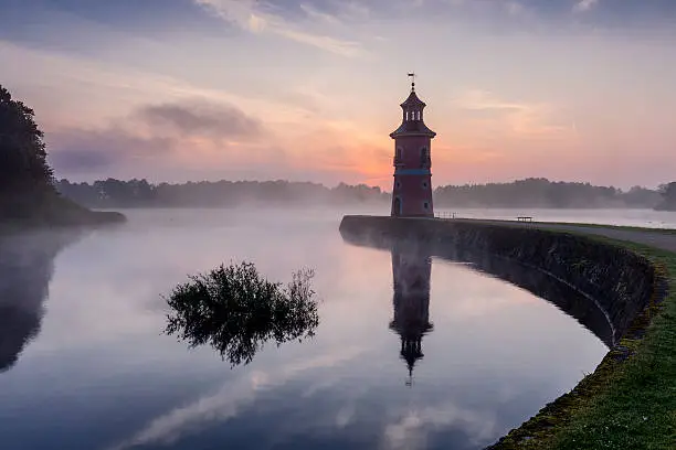 Inland lighthouse of Moritzburg in the early morning at sunrise