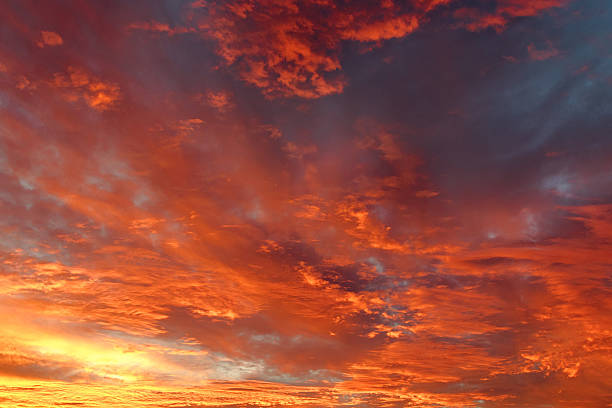 istock Dark blue sky in evening with golden yellow orange shade 578097618