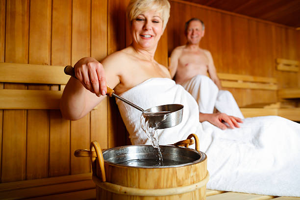 Seniors in sauna sweating and relaxing