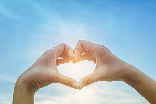 istock Woman hands making a heart shape 578099616