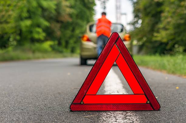 istock Unhappy driver and broken car on the road 578102656