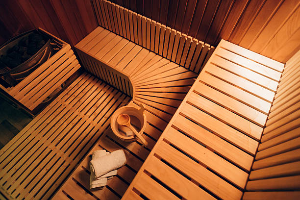 sauna Interior of a tidy wooden sauna room swedish sauna stock pictures, royalty-free photos & images