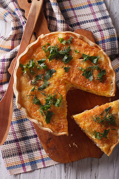 istock French quiche Lorraine close-up on the table. vertical top view 578108140