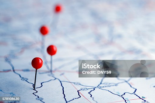 istock Push Pins On A Road Map 578108630
