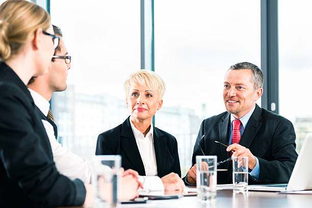istock Business - meeting in office, people working with document 578109904