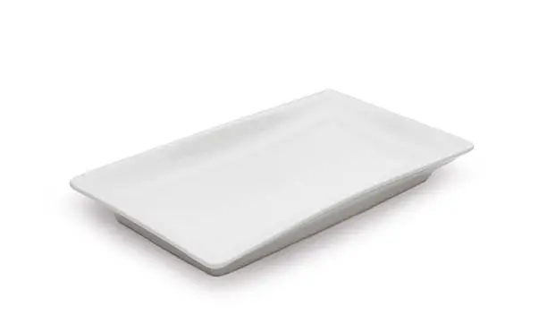 Photo of Empty white ceramic dish on white background