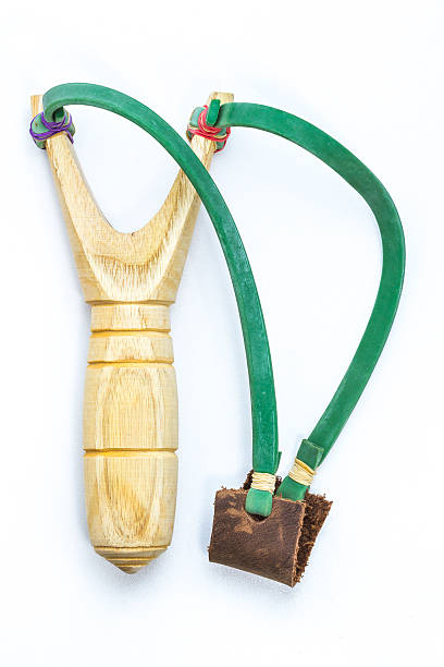 istock Wooden catapult slingshot isolated 578116558