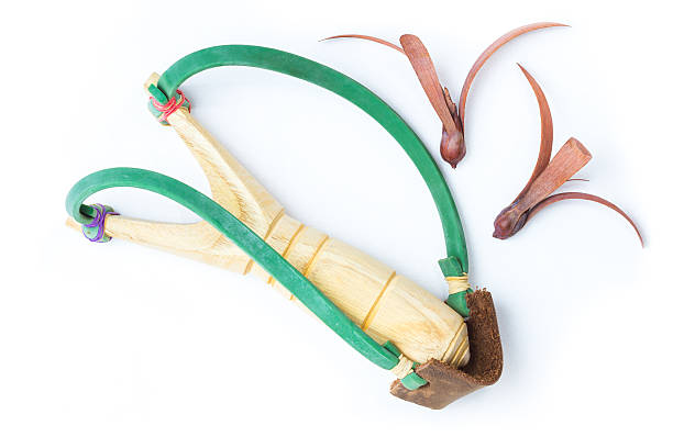 istock Wooden catapult slingshot isolated 578116592