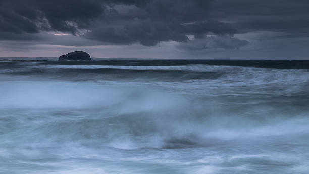 storm at the bass rock - sea bass imagens e fotografias de stock