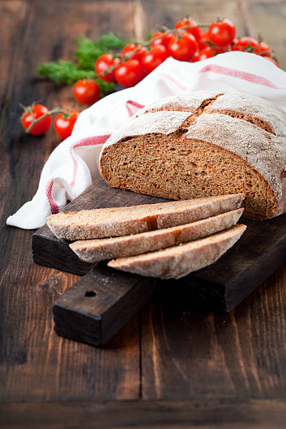 istock Homemade whole wheat bread with sundried tomatoes and herbs 578121748